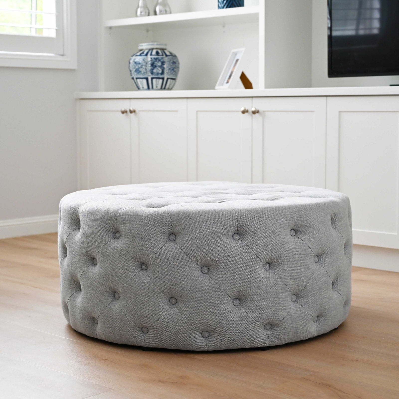 Charlotte Tufted Linen Round Upholstered Ottoman
