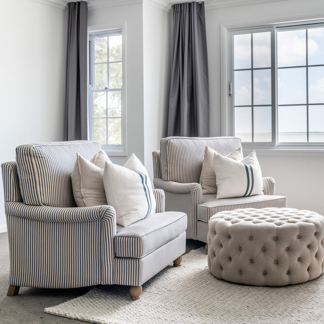 Charlotte Tufted Linen Round Upholstered Ottoman